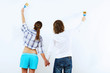 Photo: Couple with paint brushes Couple with paint brushes