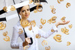 Photo: Business woman under money rain with umbrella Business woman under money rain with umbrella