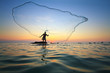 Throwing Fishing Net During Su...