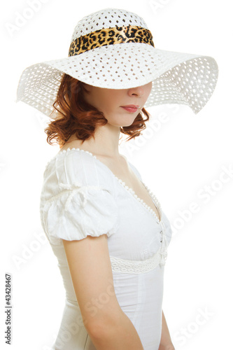 Photo: girl in the white hat hiding his eyes girl in the white hat hiding his eyes