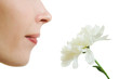 Photo: Girl smelling a flower Girl smelling a flower
