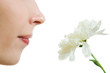Girl smelling a flower
