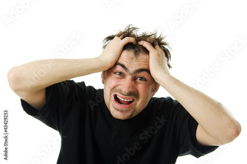 Photo: Screaming from despair a man Screaming from despair a man