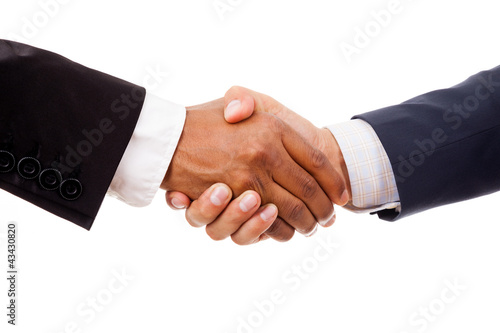 Photo: Multiracial handshake between african and a caucasian business m Multiracial handshake between african and a caucasian business m