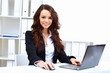 Photo: Young busines woman with notebook Young busines woman with notebook