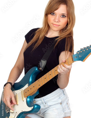 Photo: Teen rebellious girl playing electric guitar Teen rebellious girl playing electric guitar