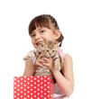 happy child girl takes cat  out gift box