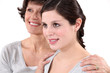 A middle age mom and her teenage daughter.