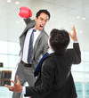 Photo: businessmen fighting businessmen fighting