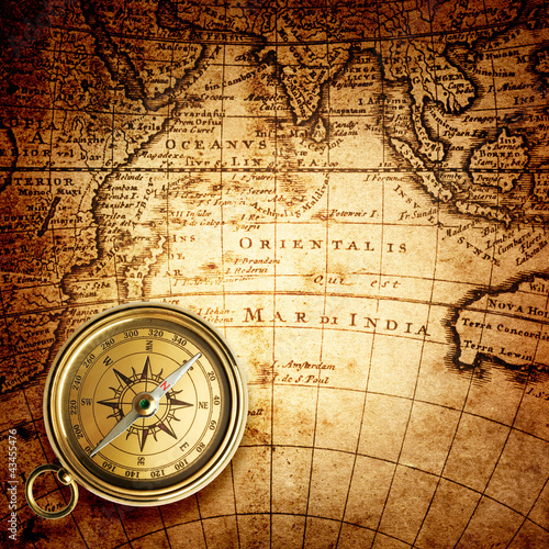 Photo: old compass and rope on vintage map 1732 old compass and rope on vintage map 1732