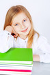Photo: small smiling girl with books small smiling girl with books