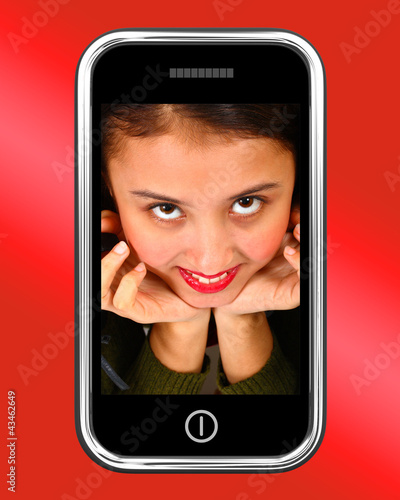 Photo: Happy Smiling Teenage Asian Girl On Smartphone Happy Smiling Teenage Asian Girl On Smartphone