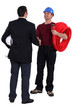Architect shaking hands with a plumber