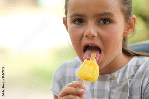 Photo: Girl eating polo Girl eating polo