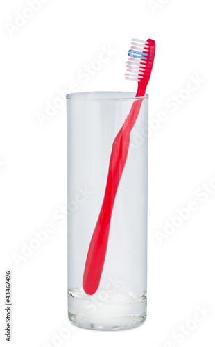 Photo: Glass with toothbrush. Glass with toothbrush.