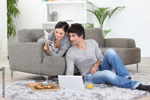 Photo: Couple taking breakfast. Couple taking breakfast.