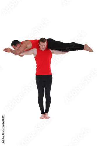 Photo: Two male gymnasts Two male gymnasts