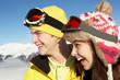 Two Teenagers On Ski Holiday In Mountains