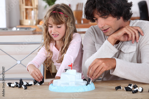 Foto: Child playing with her father Child playing with her father