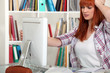 Young woman having trouble with computer