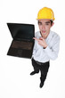 Engineer pointing to a laptop