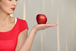 Woman holding an apple