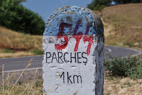 Photo: milestone, 1 Km to Parches, Tulcea, closeup milestone, 1 Km to Parches, Tulcea, closeup