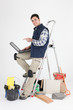 craftsman pointing at his laptop