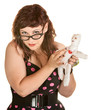 Photo: Woman With Glasses and Voodoo Doll Woman With Glasses and Voodoo Doll