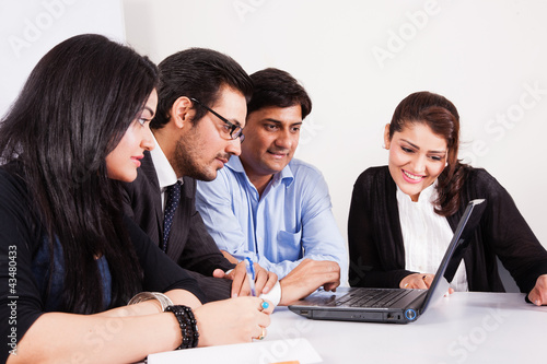 Photo: group of multi racial business people in meeting group of multi racial business people in meeting