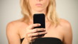 A woman with smartphone