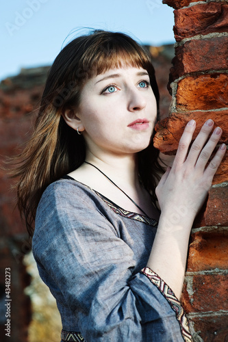 Photo: Young beautiful woman in vintage dress Young beautiful woman in vintage dress