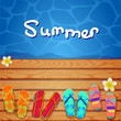 flip flops on the wood background