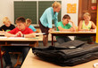 Lehrertasche auf dem Lehrerpult