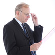 Serious businessman reading report