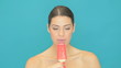 Video: Beautiful woman eating an icecream sucker Beautiful woman eating an icecream sucker