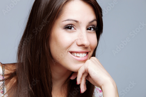 Photo: friendly smiling woman friendly smiling woman