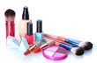 Photo: make-up brushes in holder and cosmetics isolated on white make-up brushes in holder and cosmetics isolated on white