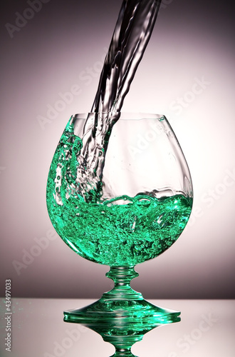 Photo: Crystal cognac glass with liquor Crystal cognac glass with liquor