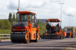 Photo: Asphalt roller and pavement machine in use Asphalt roller and pavement machine in use