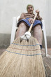 senior woman broom