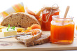 Breakfast with apricot jam and homemade bread