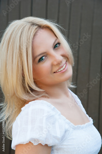 Photo: Portrait of beautiful smiling woman Portrait of beautiful smiling woman