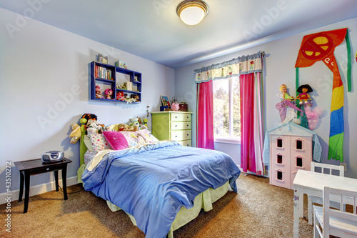 Photo: Blue girls bedroom interior. Child room. Blue girls bedroom interior. Child room.