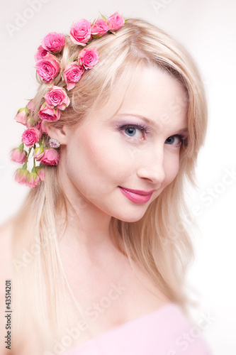 Photo: beautiful young pregnant woman wrapped into pink fabric beautiful young pregnant woman wrapped into pink fabric