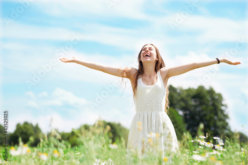 Photo: Woman with arms outstretched Woman with arms outstretched