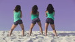 Video: Team of three pretty women dancing on the sand Team of three pretty women dancing on the sand