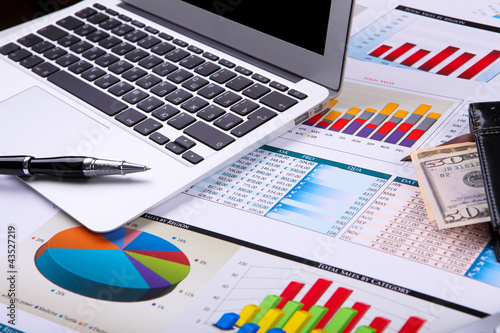 Photo: Financial papers on the table Financial papers on the table