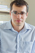 Photo: Self-employed man working at home Self-employed man working at home