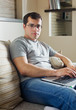 Photo: Self-employed man working at home Self-employed man working at home
